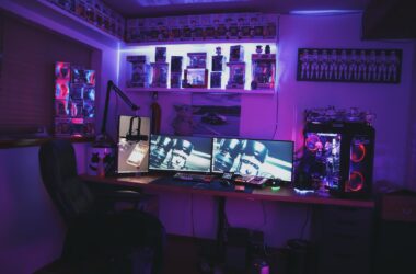 black flat screen tv on black wooden table