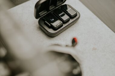 A wireless lavalier microphone kit on a desk