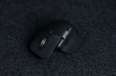 Logitech MX Master on dark felt mat, single soft key light
