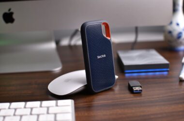 portable SSD, backup HDD and USB stick on dark desk