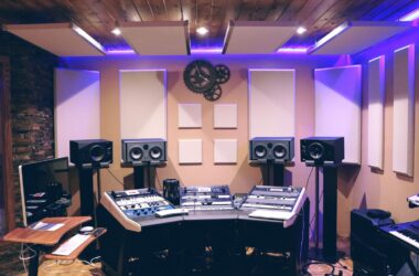 Mix room with broadband acoustic panels on the walls and studio monitors