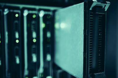 Dark server rack with drive bays and status lights
