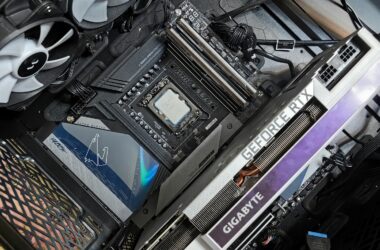 Close-up of a dark computer motherboard around the M.2 and CPU area