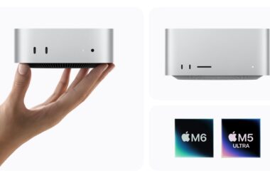 A hand holding a silver Mac mini beside a Mac Studio, with the M6 and M5 Ultra chip badges